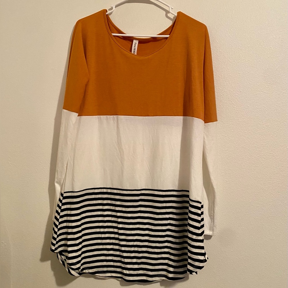 Lightweight tunic style tee shirt.